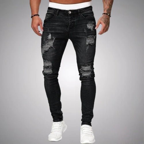 Men's distressed skinny jeans, close up of distressed detailing