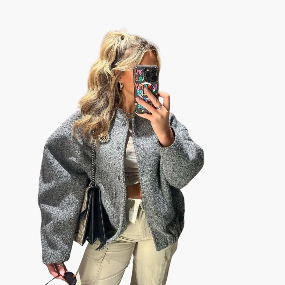 Women's bomber jacket with ribbed trim, close up of ribbed cuff and hem
