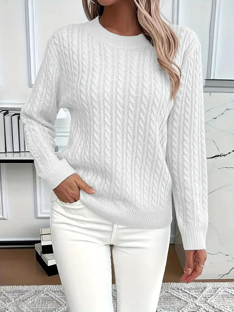 Women's cable knit sweater, close up of cable-knit texture