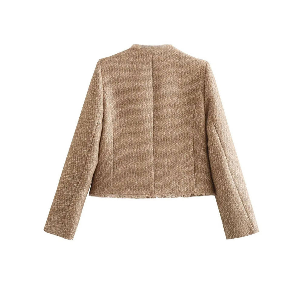 Women's elegant tweed jacket, close up of tweed texture