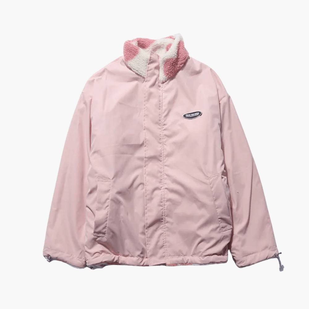 Women's reversible sherpa heart print jacket, close up of heart print sherpa side